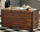 Tampa Furniture Outlet Lutz - Ashley Furniture - Kettleby Storage Trunk - Storage Trunk / Brown - A4000096